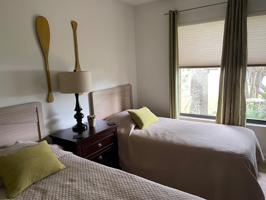 Third bedroom w desk and two twins.  Best for overflow guest as closet is mainly shelves 