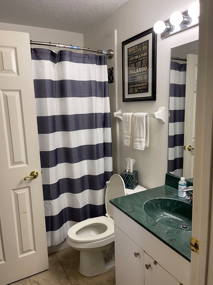 Second bath that opens to den and second bedroom. Full tub and shower. 