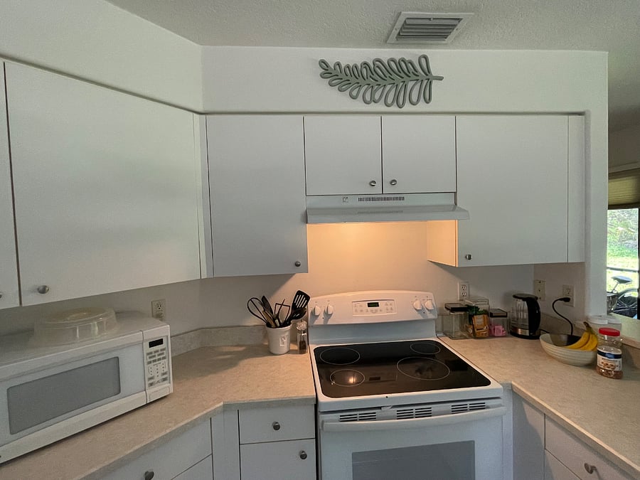 Full kitchen w microwave and full size refrigerator and stove. 