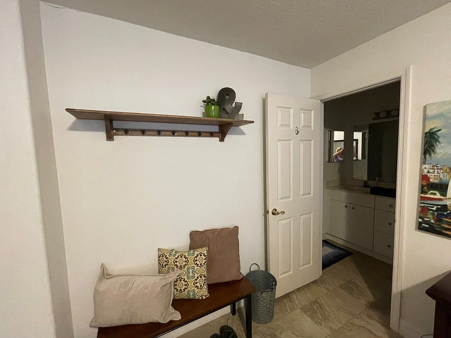 Bench for putting on shoes &  hooks for jackets and umbrellas 