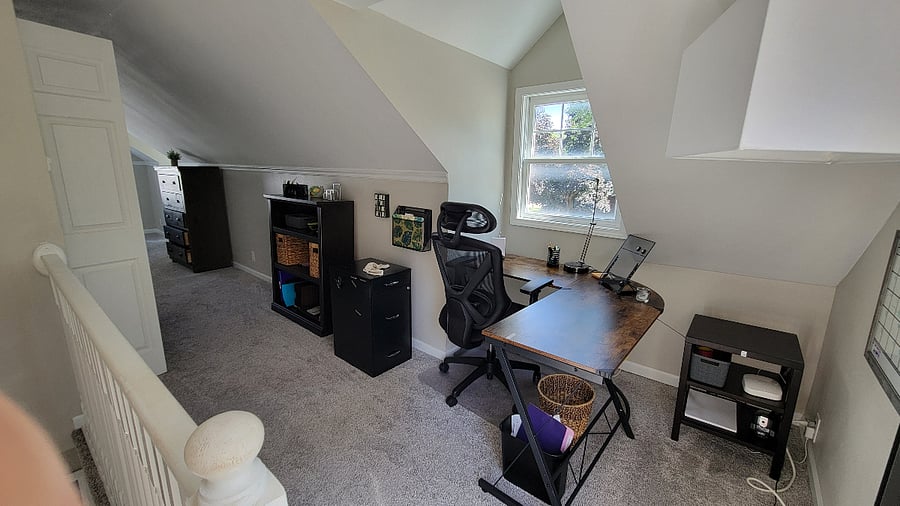 Upstairs office space with a park view.