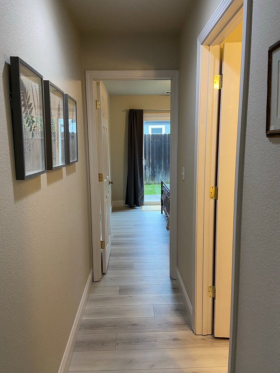 Hallway to downstairs bedroom