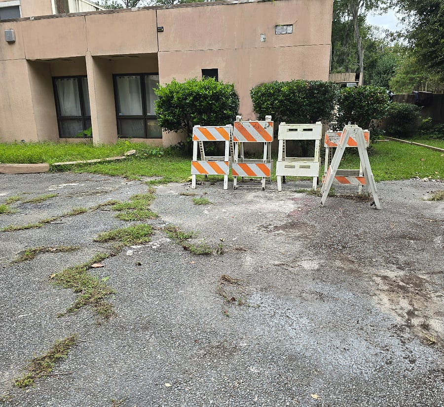 Designated parking space at the rear drive and the living room apartment windows so you can easily look out and see your vehicle. The windows are also equipped with outdoor flood lights.