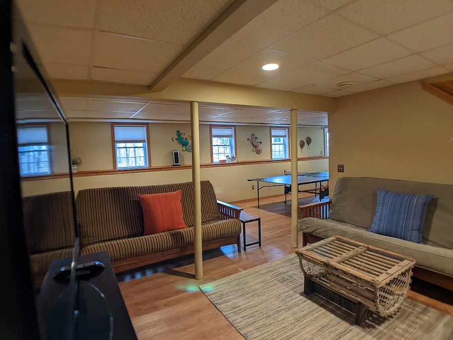 Full walk out basement with 2 queen futons, Smart TV, and ping pong table. Full laundry facilities.