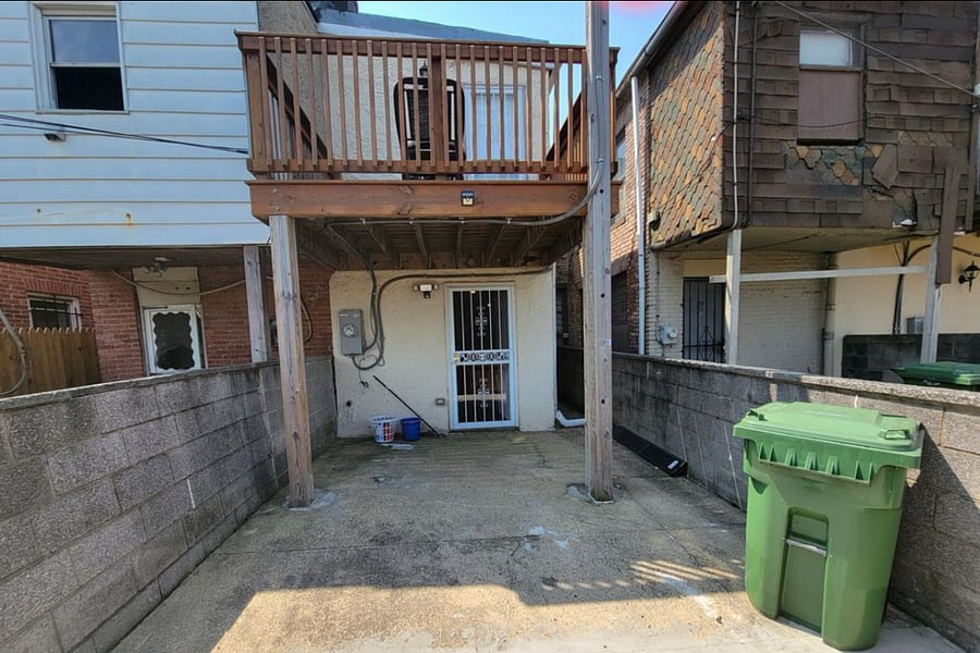 Private parking area behind house