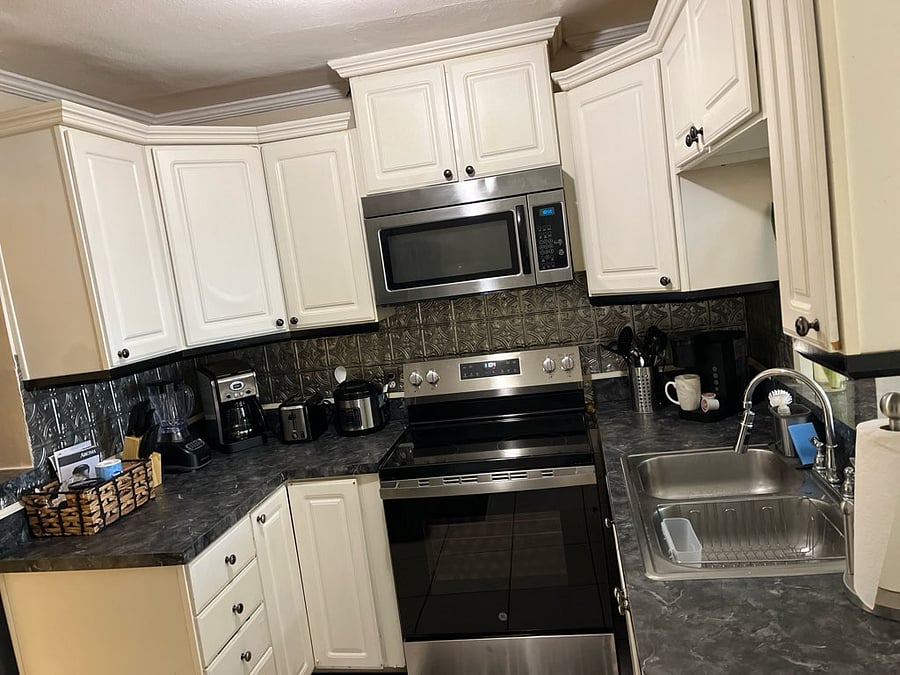Fully equipped kitchen set up for regular home cooking during longer stays.