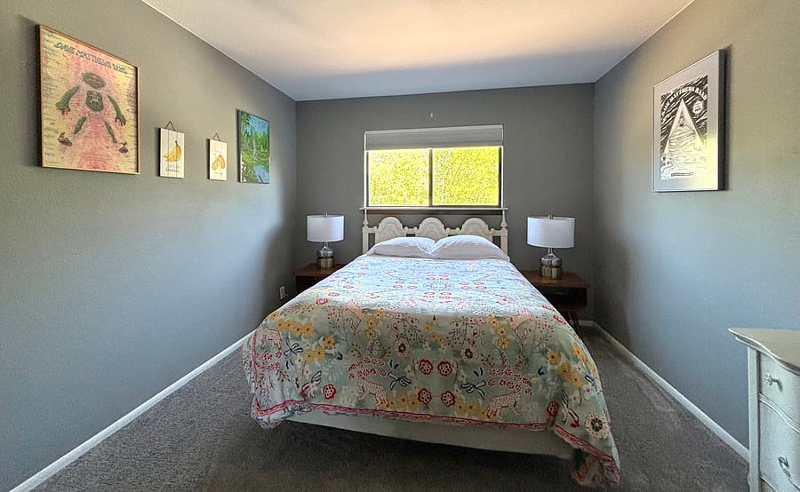 Bedroom 3: Queen bed with spacious closet and dresser.