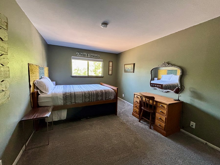 Bedroom 2: Queen bed with twin trundle, spacious closet and desk.