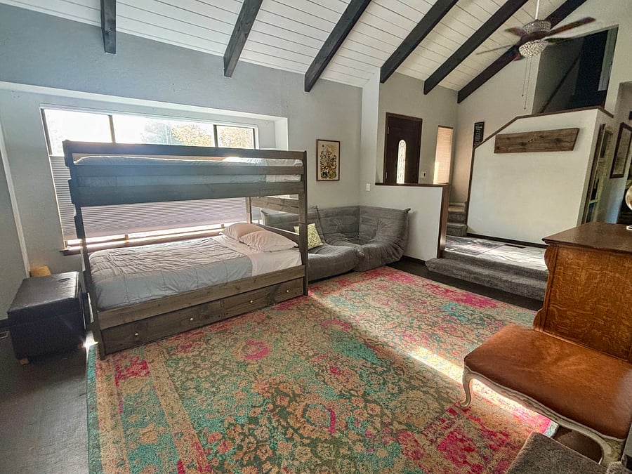 2nd living room with extra sleep space for guests. Can remove top bunk for rental to make into daybed for lounging.