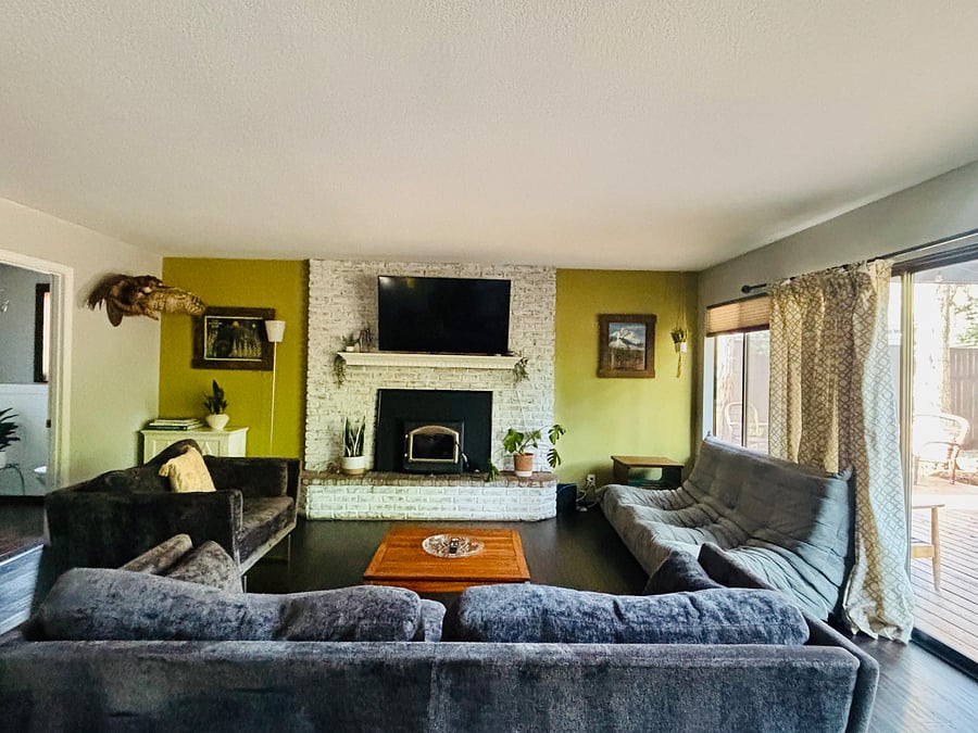 Primary living room with access to patio.