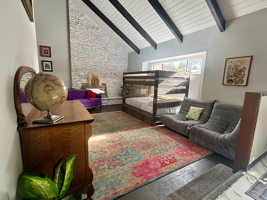 2nd living room with extra sleep space for guests. Can remove top bunk for rental to make into daybed for lounging.