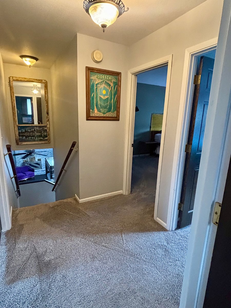 Upstairs landing pad with access to three bedrooms and bathrooms.