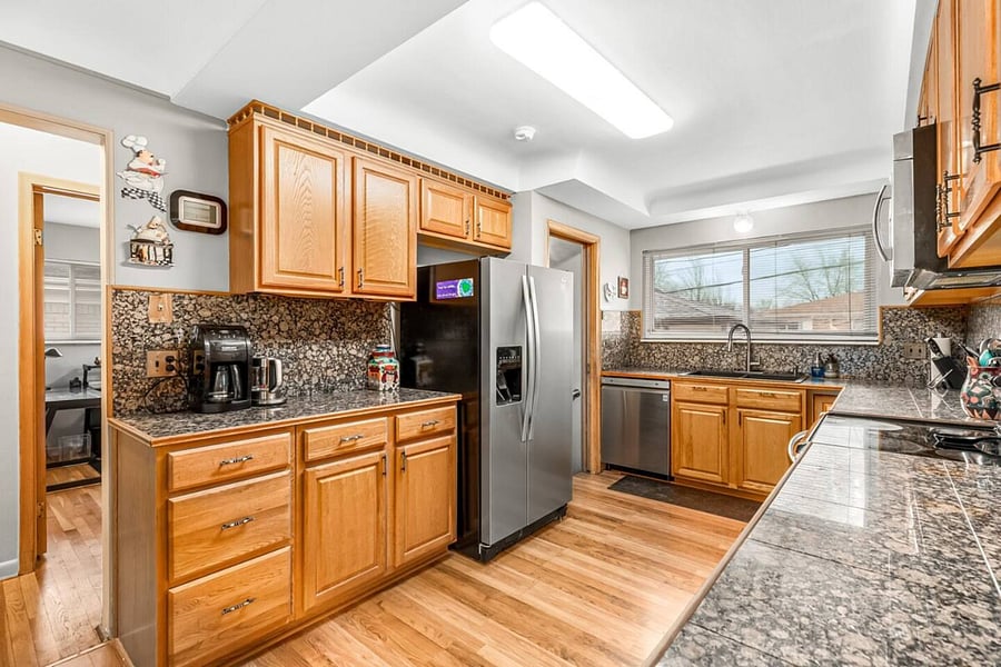 KITCHEN FROM BACK TOWARD FRONT YARD