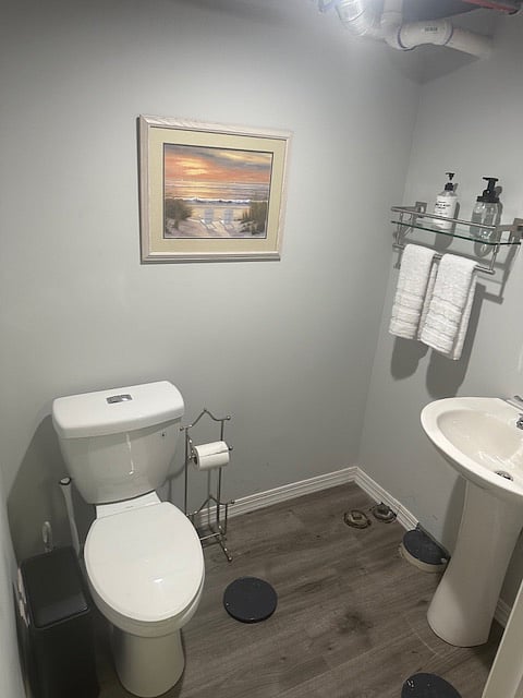 Half Bathroom in Basement off Laundry Area