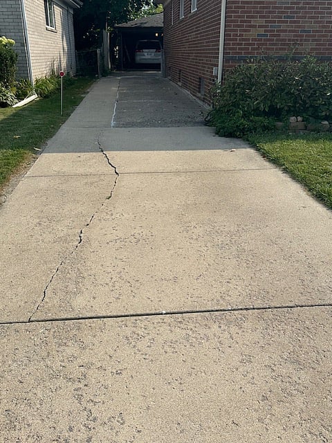 Long Driveway to Large Garage