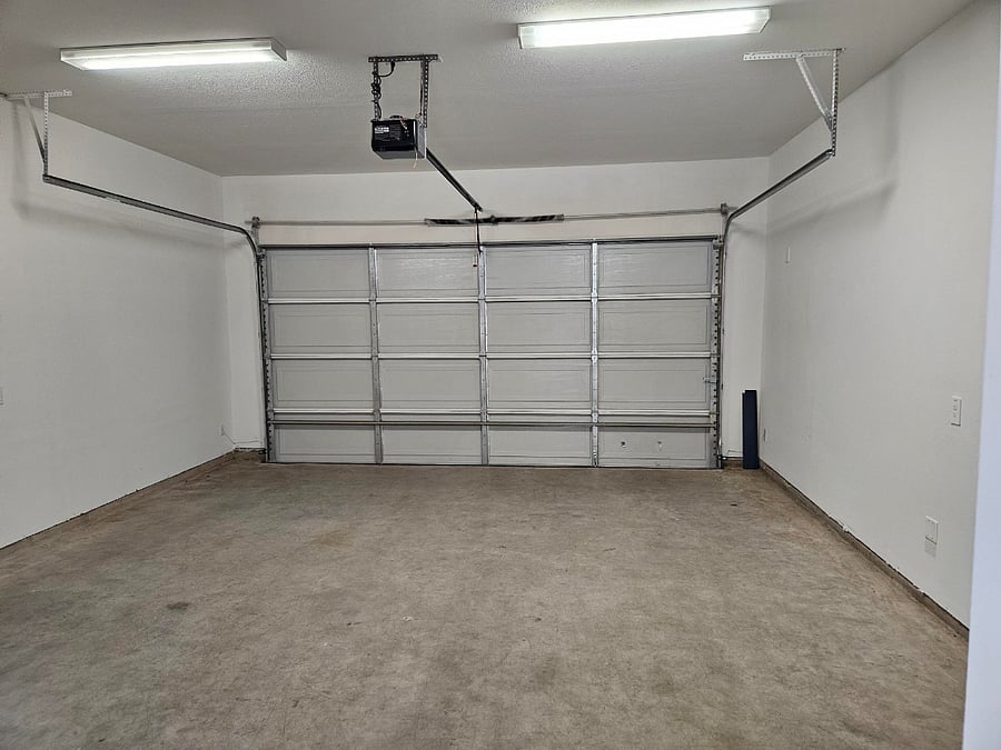 Two-car attached garage with automatic openers.