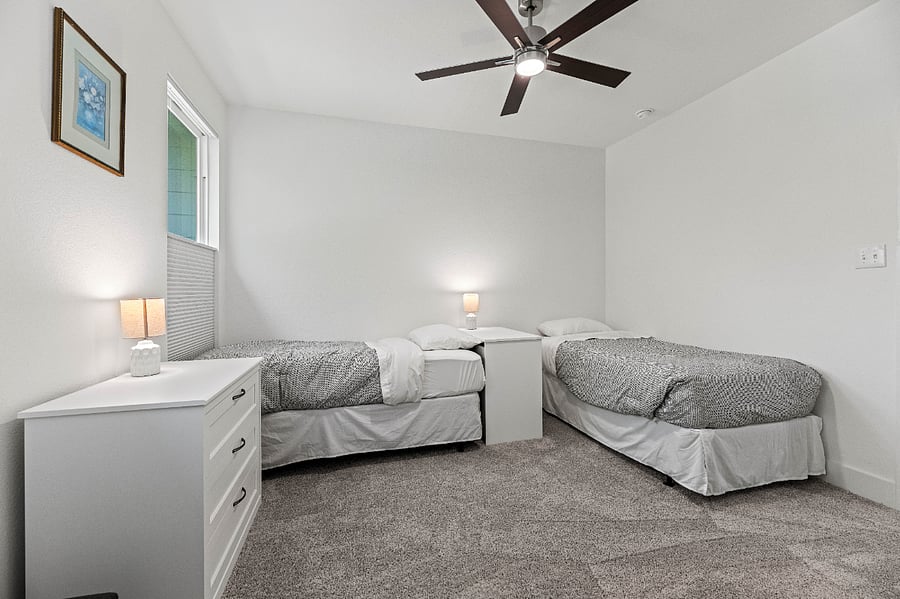 Twin beds with bedding to join beds together as a king bed