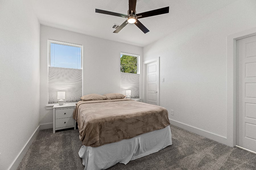 Queen bed with walk-in closet