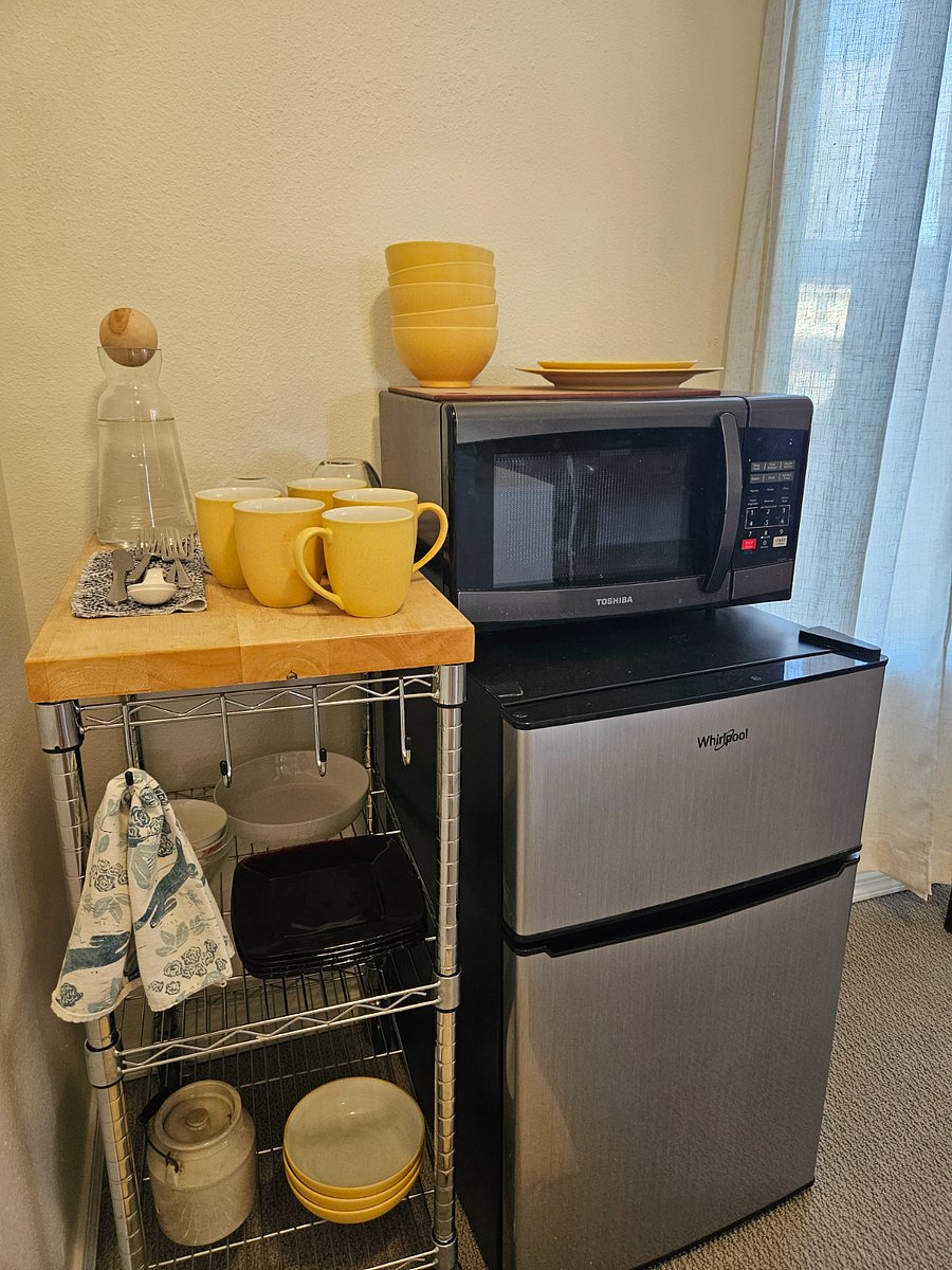 Dishes, microwave and mini fridge upstairs for convenience.