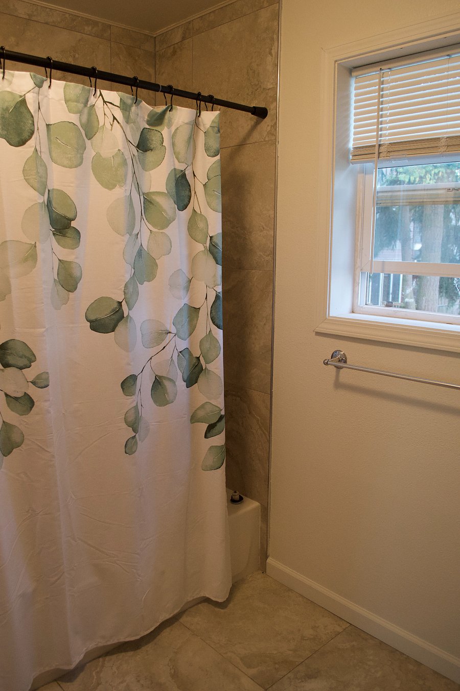 Private bathroom. Includes bathtub a and storage space.