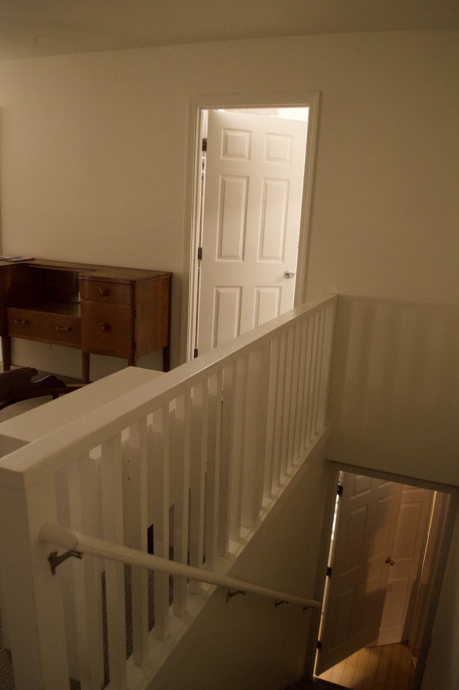 Stairs leading down to laundry and kitchen