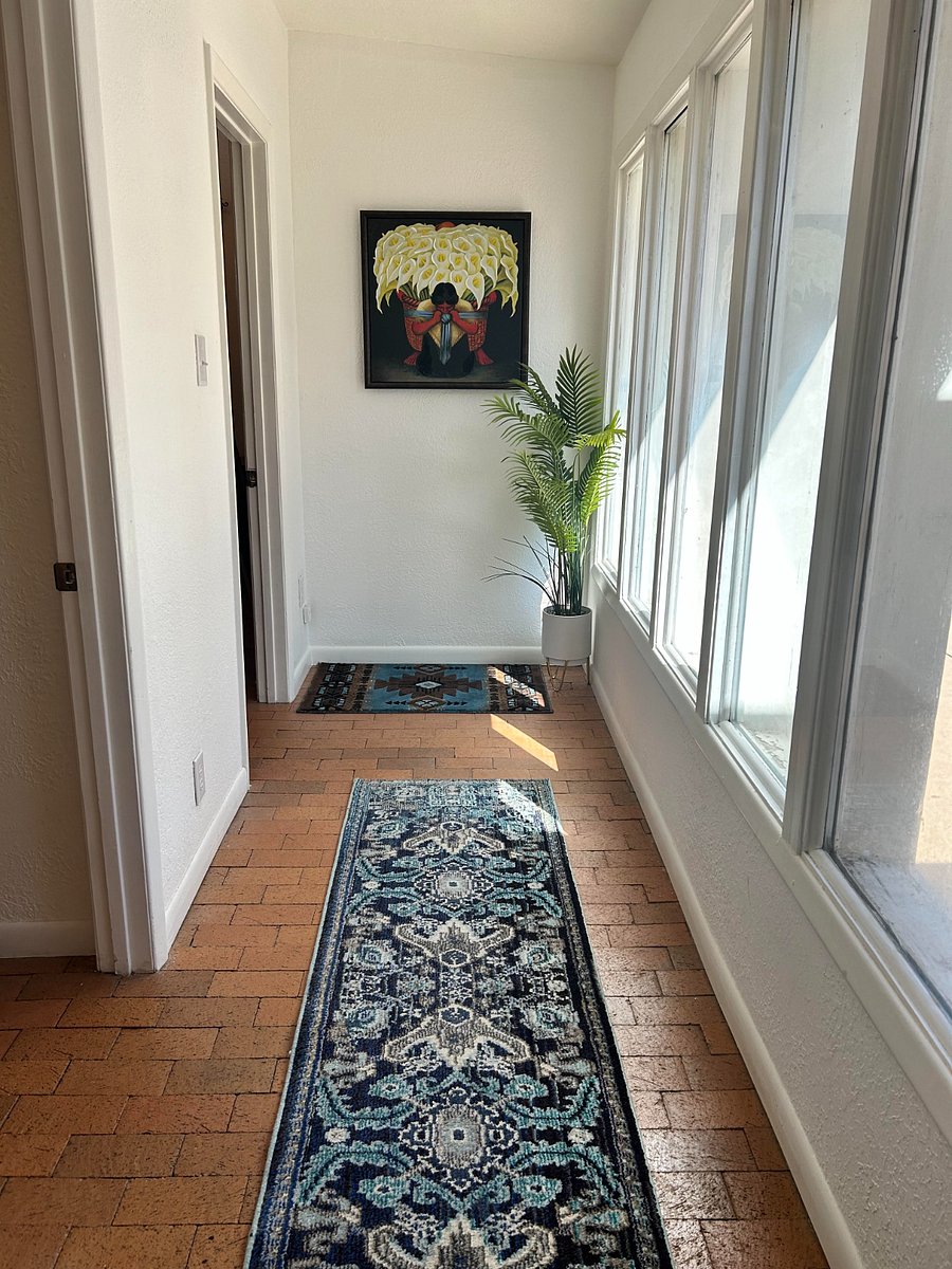 Hallway lined with large windows