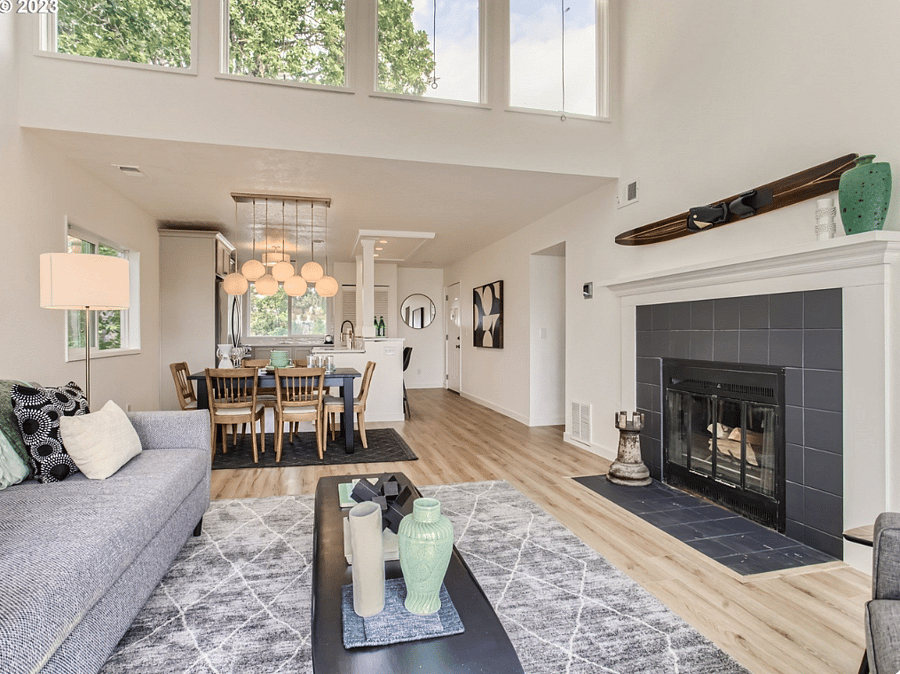 Living area with fireplace and television