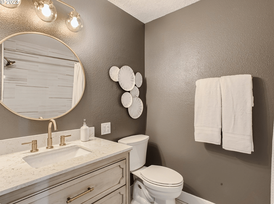 Bathroom vanity and toilet