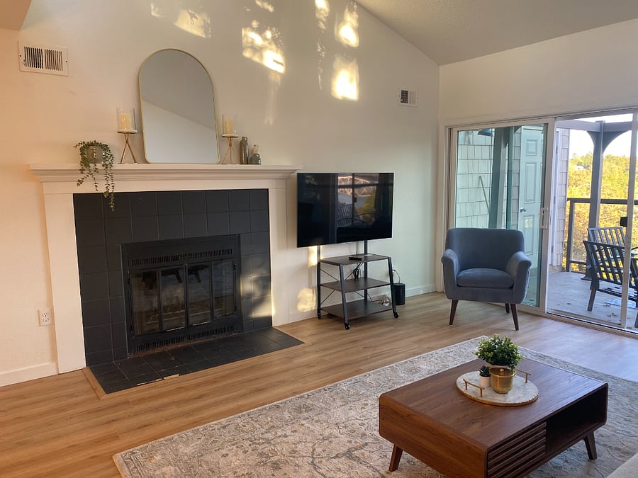 Currently there is a Smart TV next to the fireplace