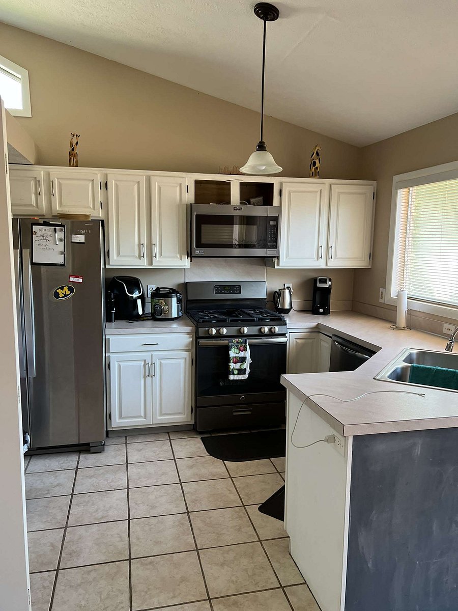 Fully Stocked Kitchen. Fridge on Main floor.