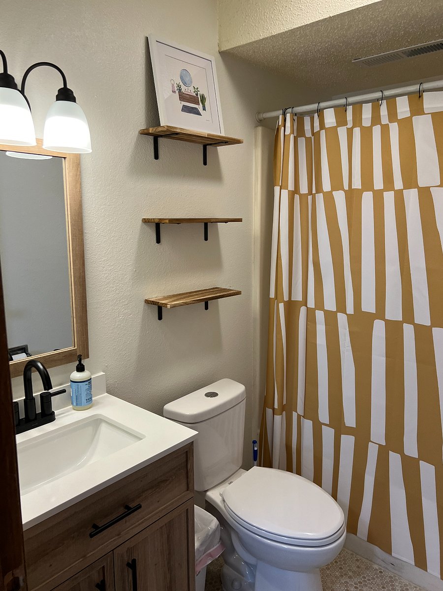 updated bath pic w/ shelving 2025