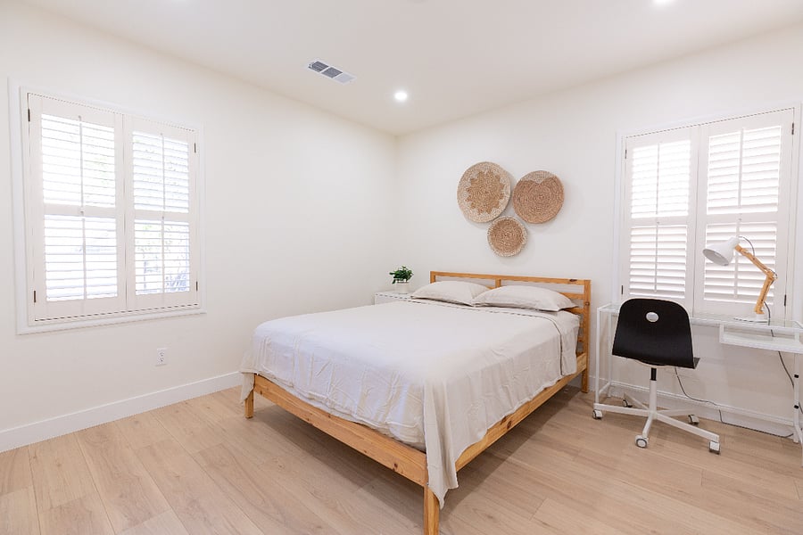 Queen bed with night stand and desk workspace to serve as your office on days you work from home. Room includes large 3 door wardrobe closet for your storage needs