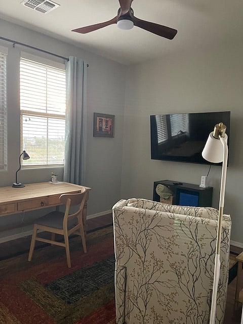 55" Samsung TV 
Sitting room w Desk
