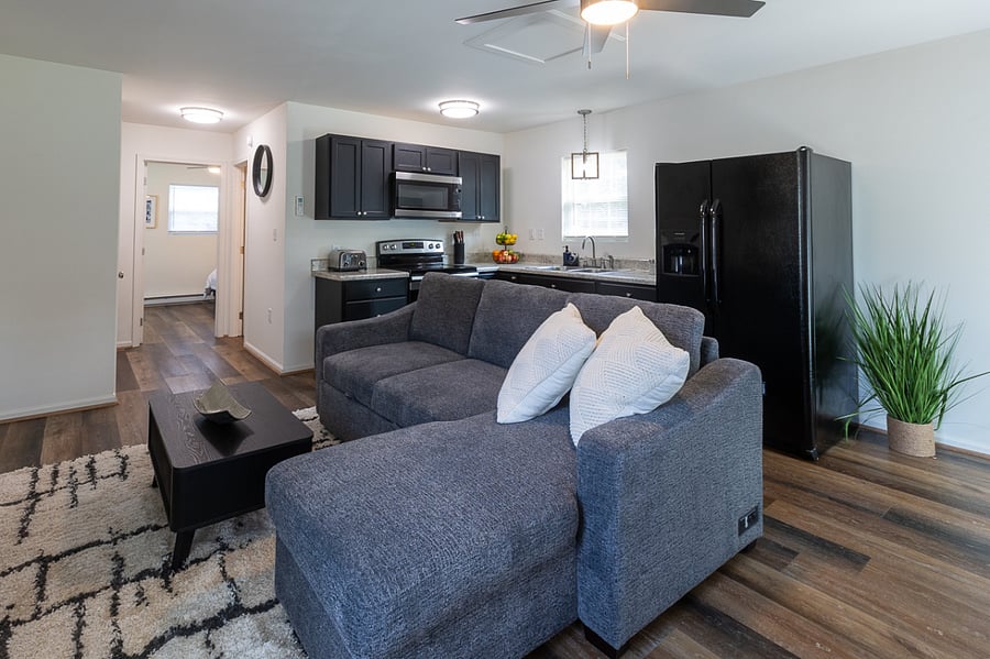 Kitchen with full size refrigerator, oven and microwave