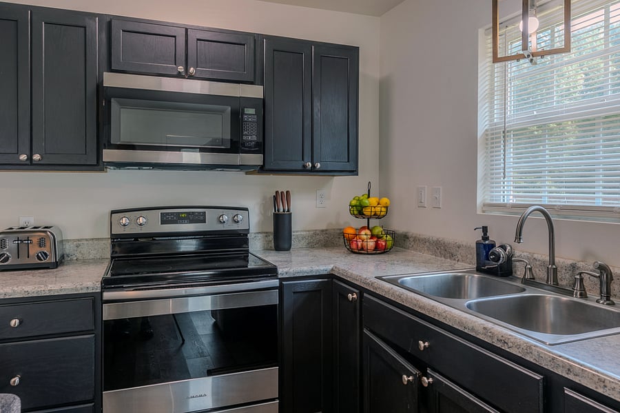 Kitchen stocked with cooking supplies for your stay.