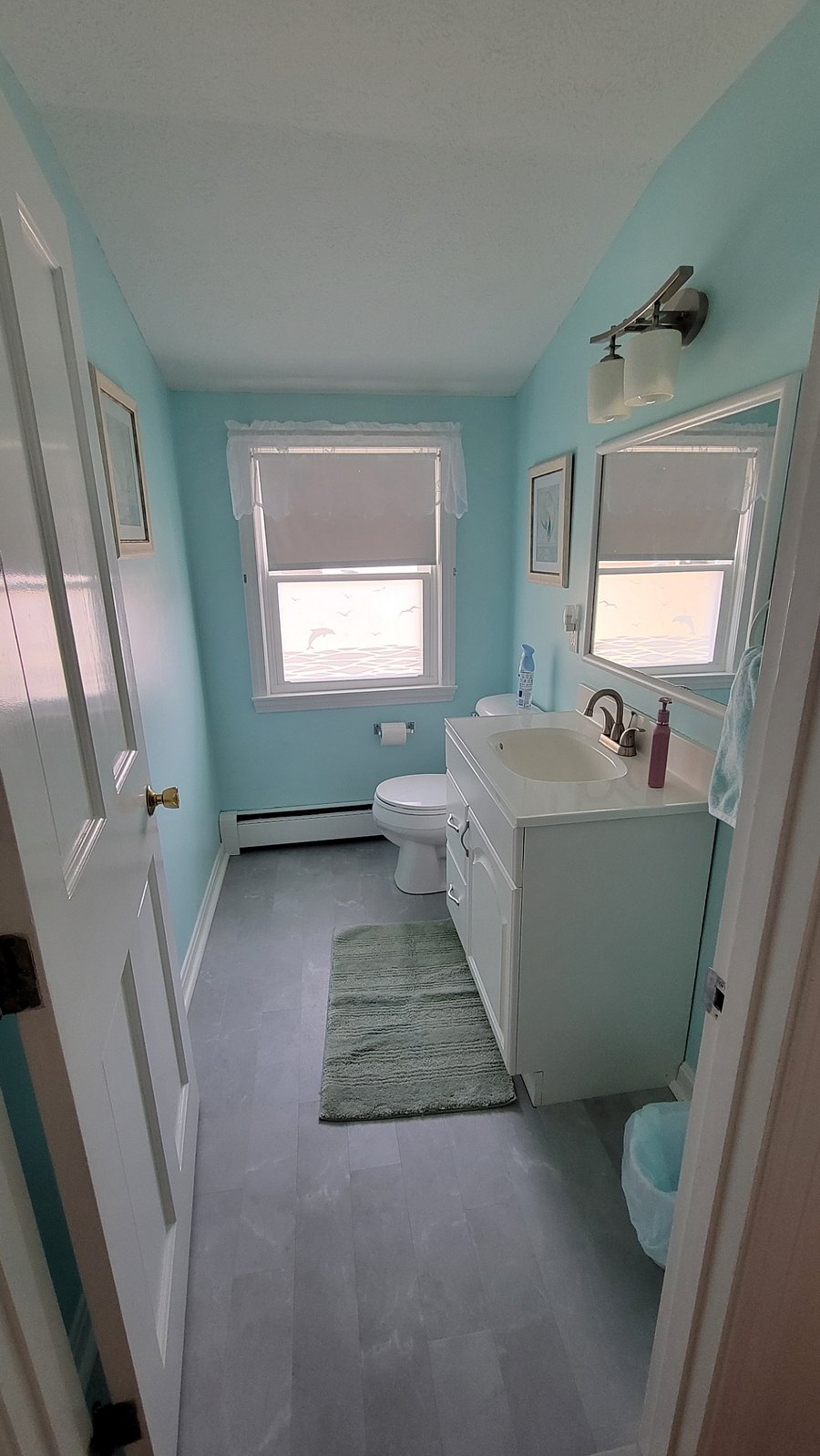 Half bath, second floor. New floor, fresh paint.