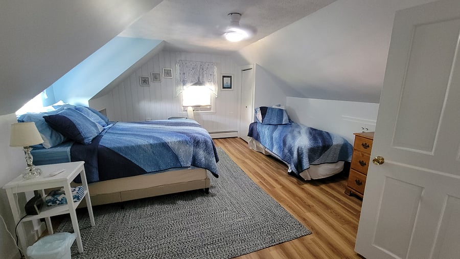 Second floor bedroom, 1 queen, 1 twin. New beds, new flooring. Fresh paint.