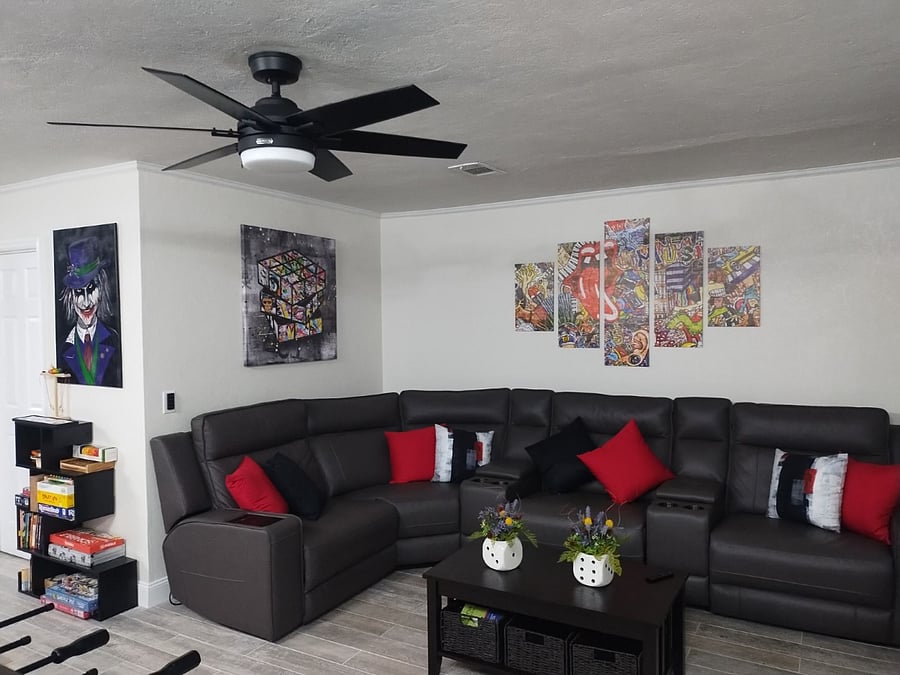 Fully reclining leather sectional with Bluetooth speakers and wireless chargers
