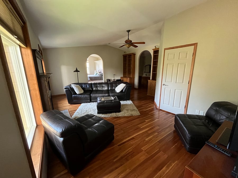 Master suite living room with gas fireplace