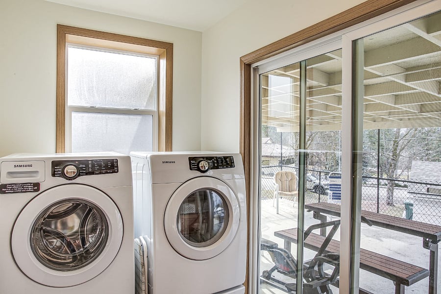 Washer / Dryer and entrance to Covered Patio / BBQ 