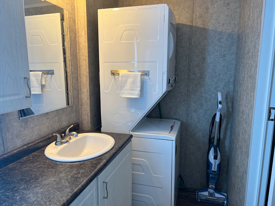 Washer and dryer.  Bissel vacuum and mop floor cleaner.