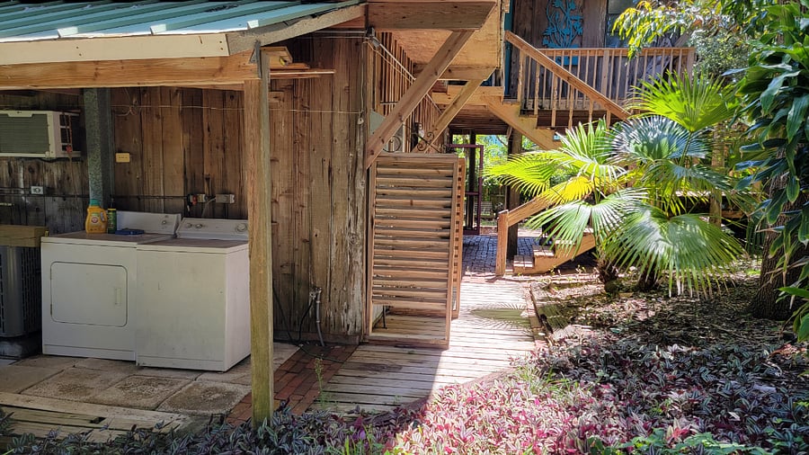 Onsite washer / dryer to left and and outside shower center