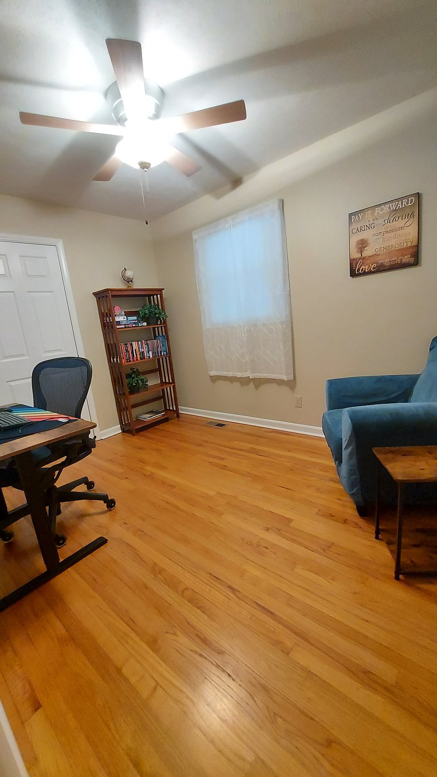 Private home office and reading room (converted 3rd bedroom), complete with sit/stand electric desk, comfortable office chair, monitor, and USB-C dock to connected laptop.