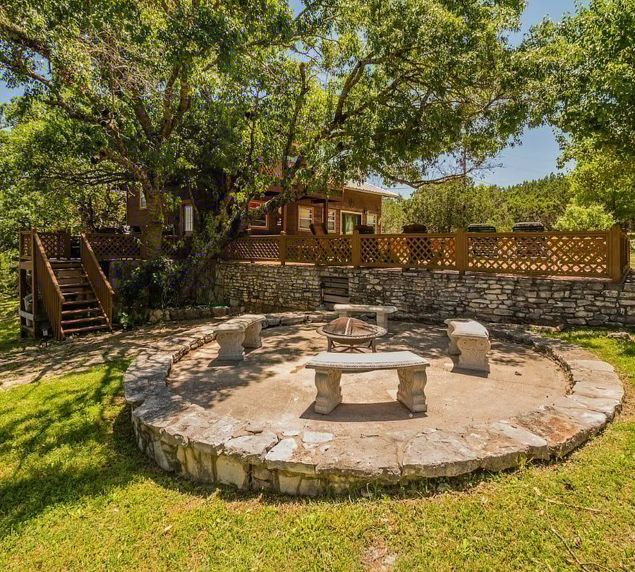 Fire pit and main deck. Note that the house was painted in May 2024 and we don't have updated pictures yet!