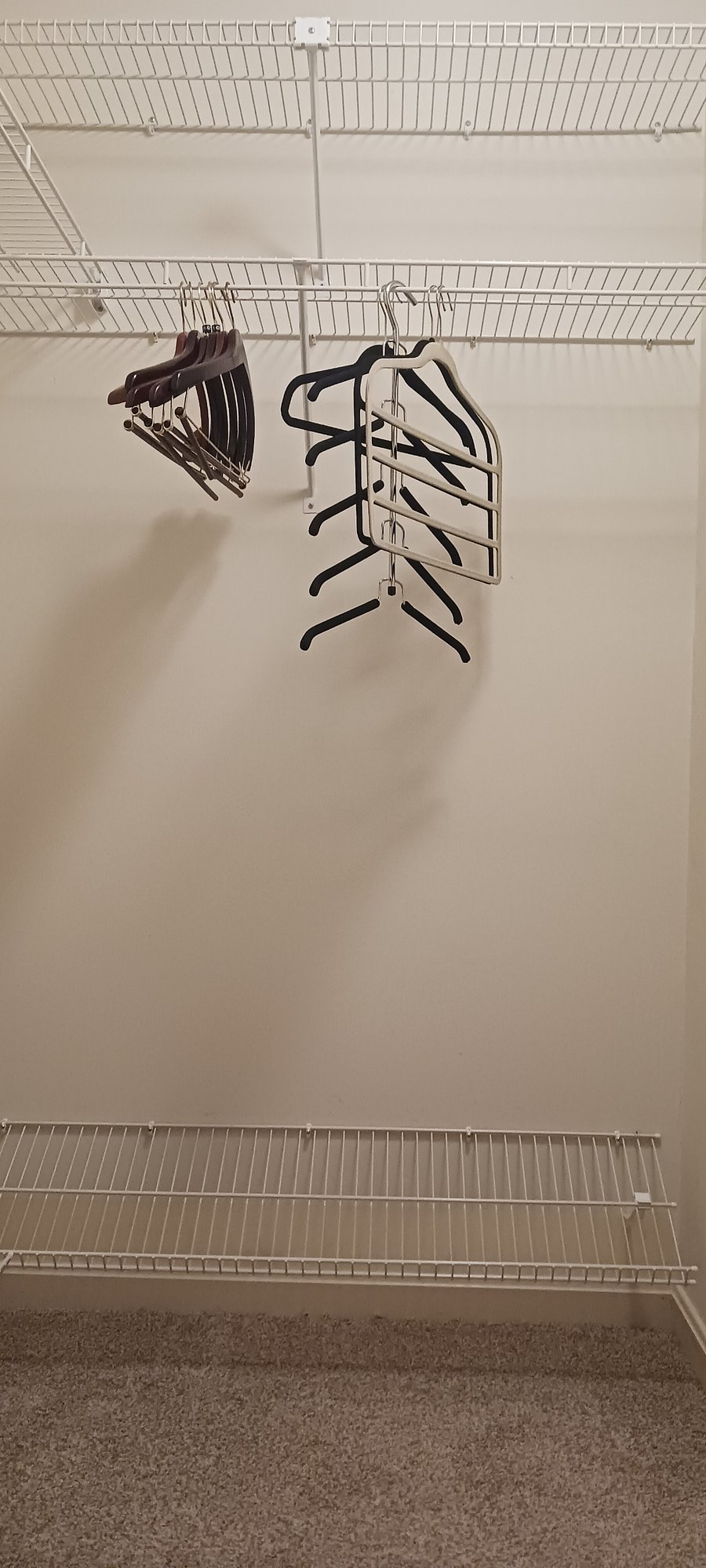 Walk-in closet (three walls are with upper and lower shelves)