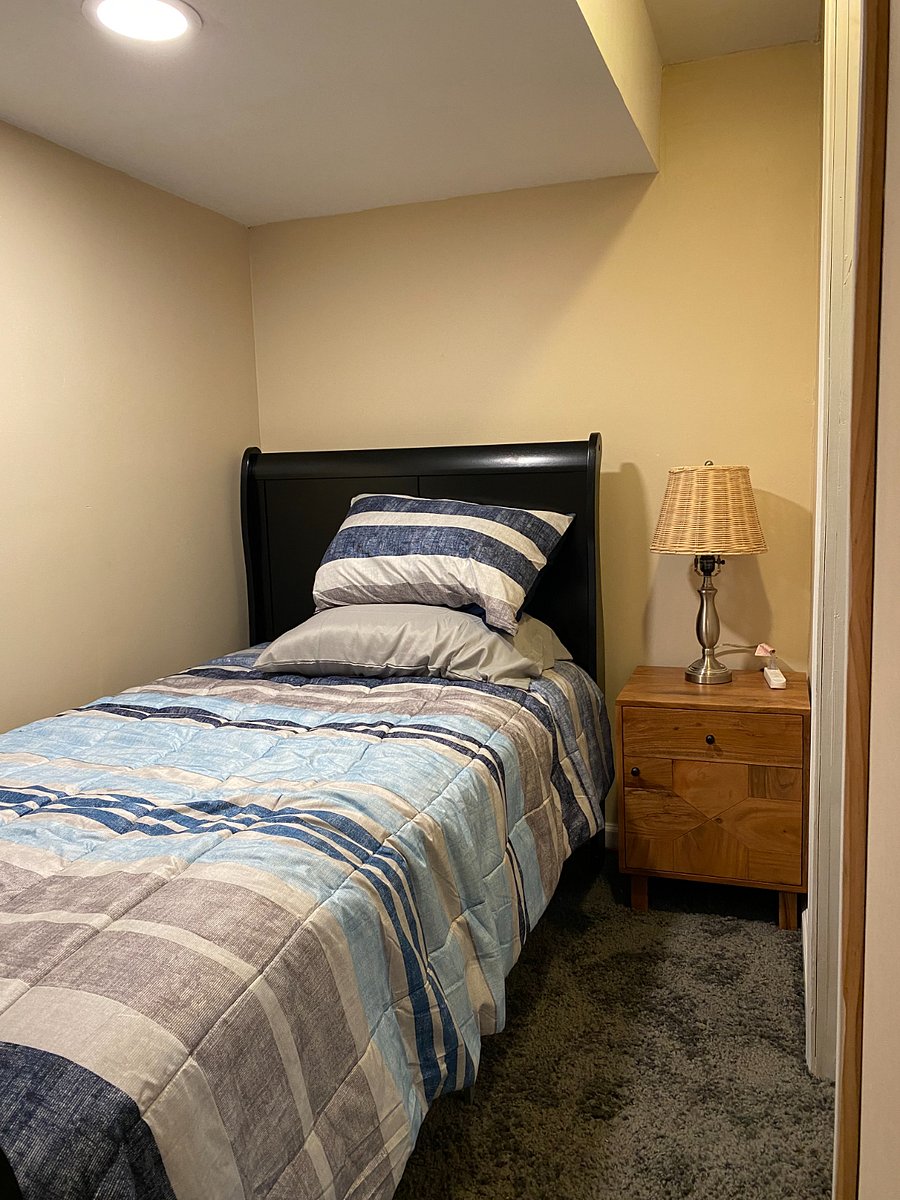 RM #1 Basement Twin Bed, shared full bathroom, common area with Firestick TV.
