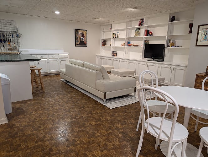 Dining Table with 4 seats. We provided 2 extra seats (6 total) for extra seating.