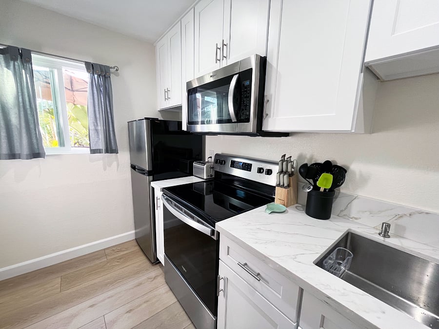 The kitchen features stainless steel appliances for your use.