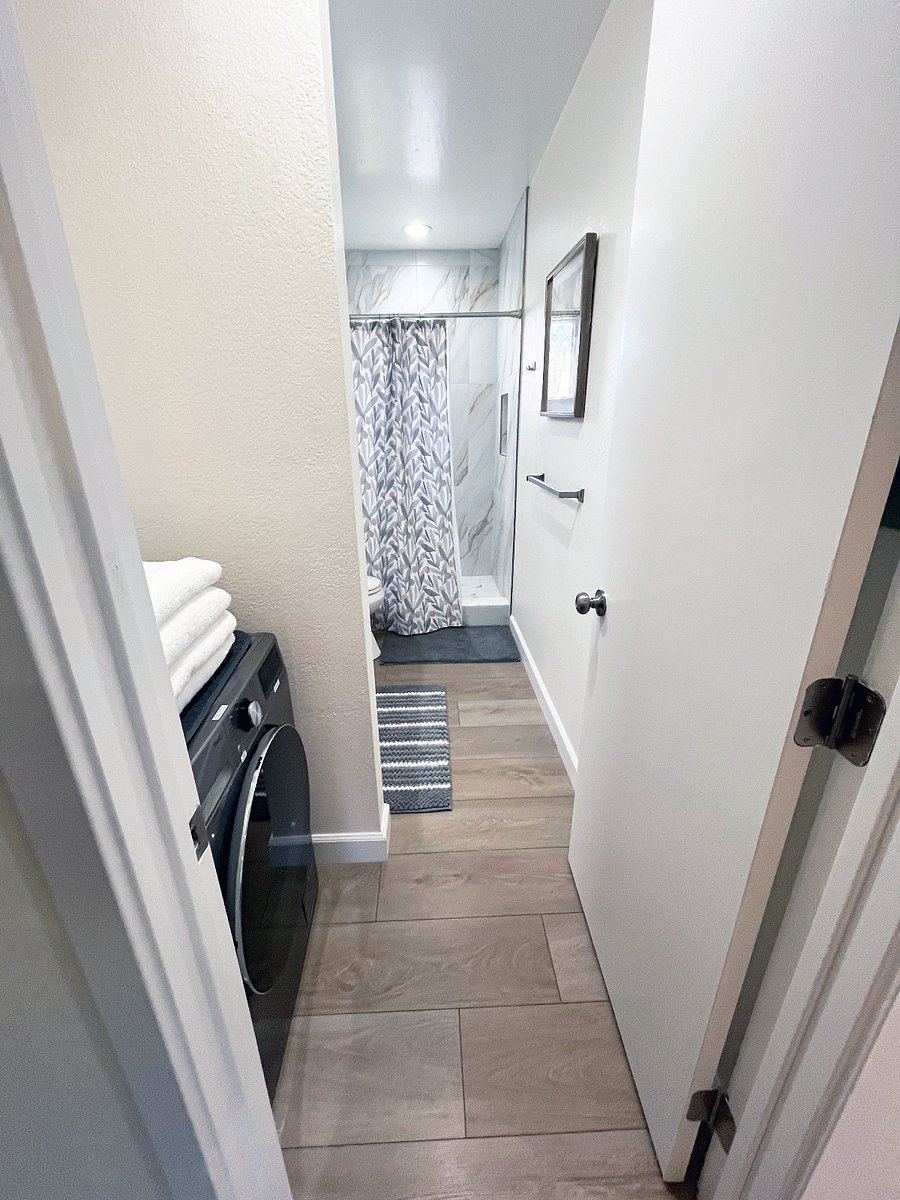 This is the walkway from the living room to the bathroom.
