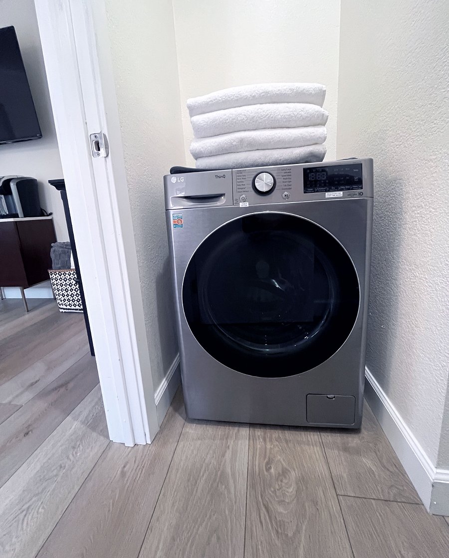 There is an all-in-one Washer/Dryer machine for your use.